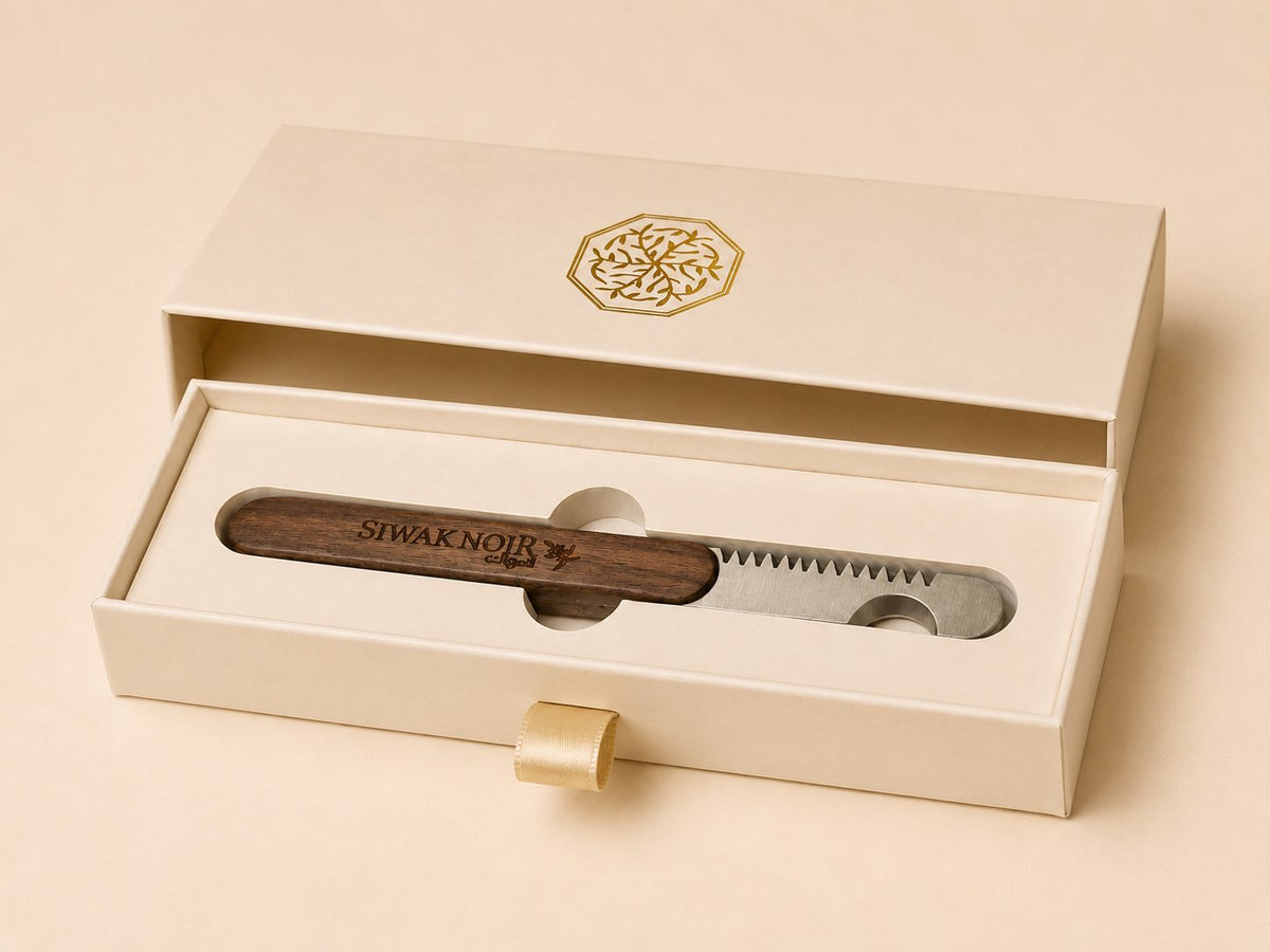 Siwak Cutter inside its open luxury presentation box